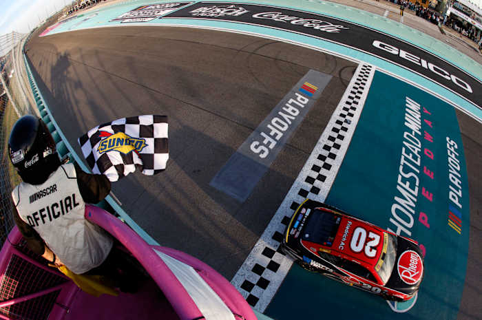 Christopher Bell takes the checkered flag to win Sunday's 4EVER 400 Presented by Mobil 1 at Homestead-Miami Speedway. (Photo by Sean Gardner/Getty Images)